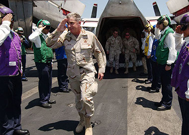 Troops disembarking military helicopter